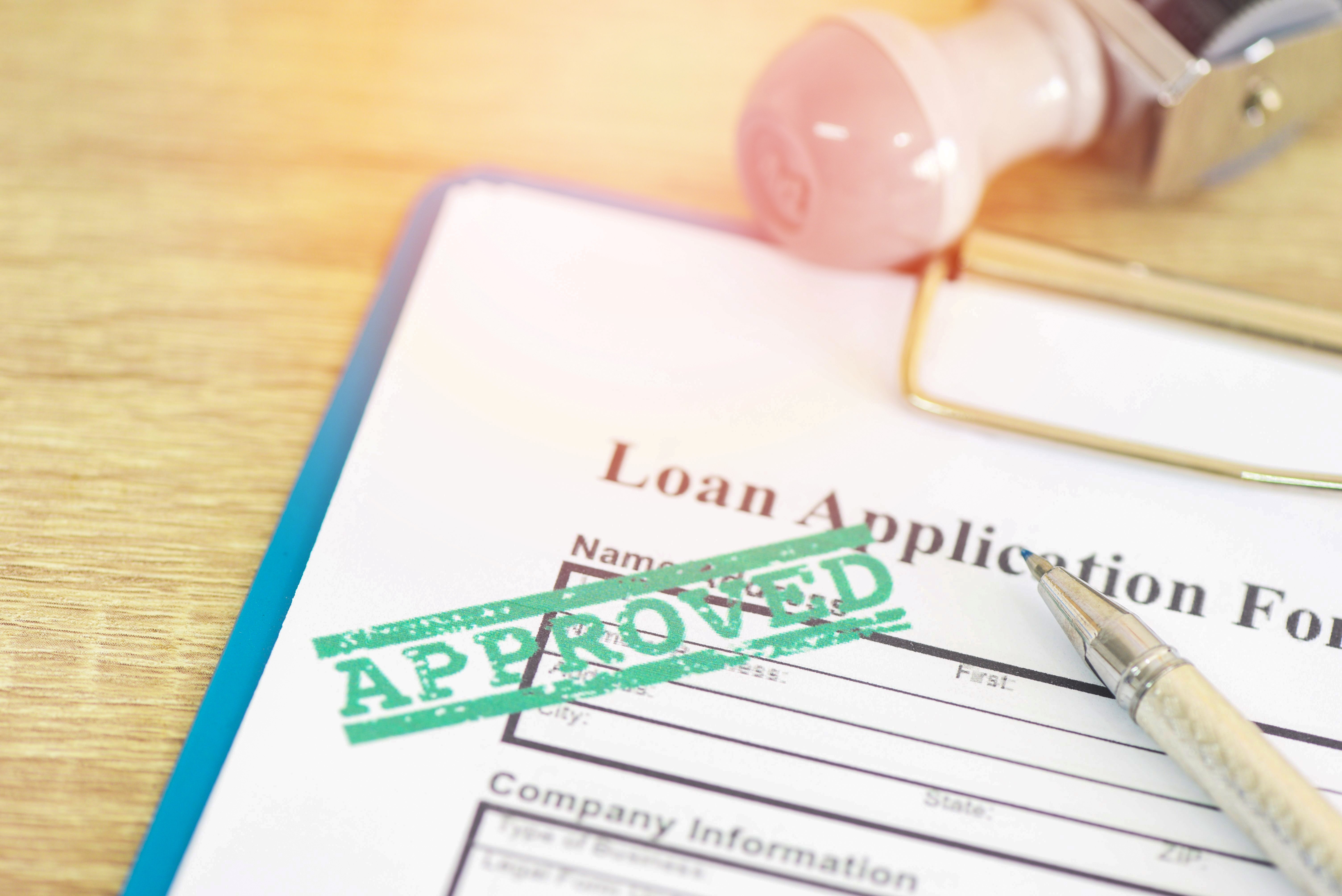 loan application form with approved stamp